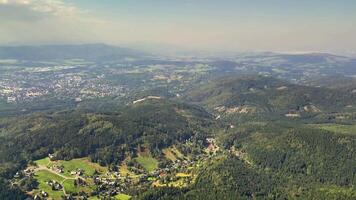 A breathtaking aerial image beautifully showcasing serene valleys along with vibrant greenery surrounding them photo
