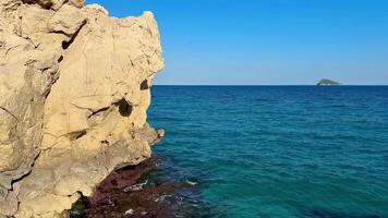 Experience breathtaking ocean scenes that beautifully showcase stunning rocky shores and tranquil turquoise waters photo