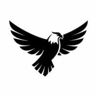 Elegant black eagle silhouette with wide wings spread vector