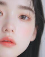 Close up view of a woman showcasing perfect skin, soft features, and cosmetic beauty photo