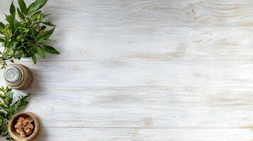 Natural wooden table with green plants and decorative items for cozy atmosphere photo
