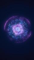 Glowing particle sphere with cosmic energy radiating in violet and blue hues on a dark background video