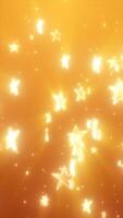 Floating glowing yellow stars scattered across a bright golden background with dreamy bokeh light effects video