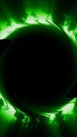 Green glowing vortex surrounded by swirling energy clouds and radial light rays forming a dramatic sci-fi portal video