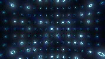 Abstract glowing grid of blue neon circles radiating in a symmetrical digital tunnel, evoking futuristic and immersive visual effects video