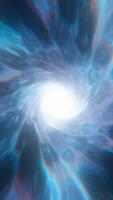Radiant swirling vortex of light and color spirals outward in an abstract luminous tunnel video