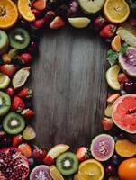 Colorful Fruit Frame Created With Various Fruits on a Wooden Table for Social Media Engagement and Food Presentation photo