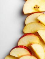 Sliced Apples Arranged Vertically With a Blank Upper Zone Creating a Minimalist Background for Culinary Presentation photo