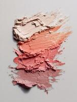 Neutral Tone Matte Clay Smear Texture Features a Vibrant Pink and Orange Gradient, Showcasing Artistic Blending and Layering Techniques photo