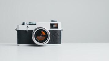 Classic vintage camera on a minimalist background showcasing intricate design and craftsmanship photo