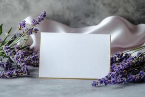 Elegant Lavender Arrangement With Blank Card on Soft Fabric Background for Personalized Messages. photo