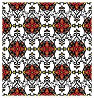 A vibrant paisley textile pattern featuring intricate red, black, and yellow floral motifs on a white background, repeating symmetrically. vector