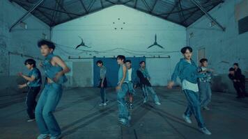 Diverse group of dancers practicing in a studio with industrial vibes, showcasing energy and movement video