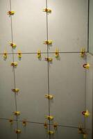 Wall Installation With Tile Spacers in a Modern Setting During a Renovation Project photo