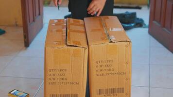 Unpacking Cardboard Boxes Indoors video