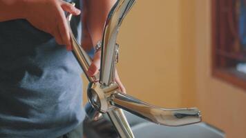 Shiny Metallic Steering Wheel in Hands video