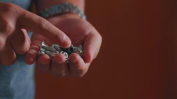 Handful of Metal Nuts and Bolts for DIY Projects video