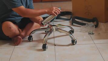 Assembling a Chrome Office Chair Base at Home video