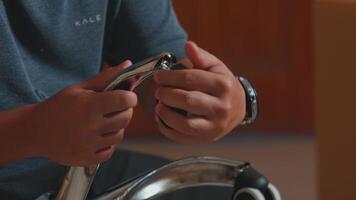 Hands Assembling a Metal Chair Component video