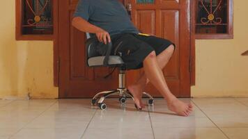 Person Relaxing in an Office Chair video