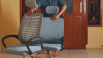 Adjusting an Ergonomic Office Chair in a Home Setting video