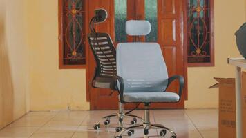 Two Ergonomic Office Chairs in a Room video