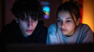 Understanding the Key Differences Between Cyberbullying and Trolling in Online Interactions Among Teenagers in a Dimly Lit Room photo