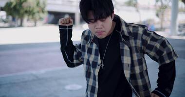 Stylish man with dancing skills, moving body coolly and stylishly to the rhythm. Solo dance. video