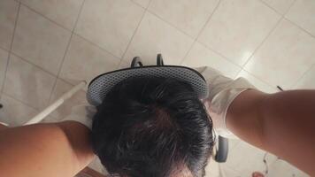 Overhead View of a Person Resting on an Office Chair video