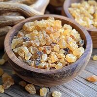 Aromatic Frankincense Resin in Wooden Bowl Close-up Image of Natural Incense. photo