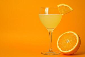 Refreshing Orange Juice in a Glass with Orange Slices on a Vibrant Orange Background. photo