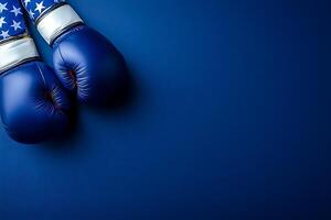 Patriotism and Competition American Flag Boxing Gloves on a Blue Background. photo