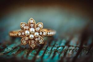 Close-up of Elegant Flower-Shaped Ring with Pearls and Diamonds on Rustic Wooden Surface. photo