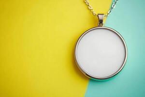 Blank Circular Pendant on Yellow and Teal Background Perfect for Mockups and Branding. photo