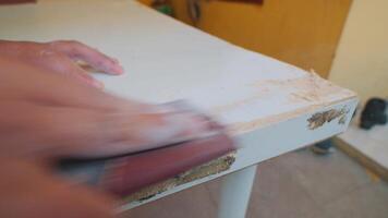 Sanding a White Table Surface video