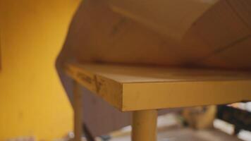 Hands Handling Paper on a Wooden Table video