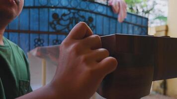 Crafting a Wooden Object in an Outdoor Workspace video