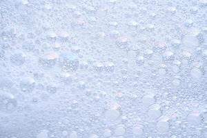 The texture of dense foam with bubbles. photo