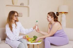 Dietitian and Nutritionist Advising Plus Size Woman on Healthy Eating and Weight Loss in Modern Clinic photo