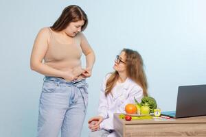 Dietitian and Nutritionist Consulting Overweight Woman About Weight Loss and Healthy Lifestyle photo