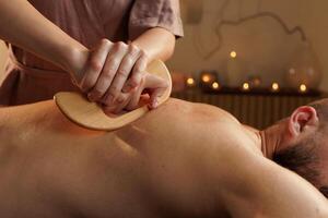 Professional Gua Sha Wooden Scraper Massage Therapy for Back Muscle Relief and Deep Tissue Healing photo
