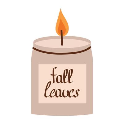 Burning interior candle with the aroma of autumn leaves. of a lit candle for home comfort