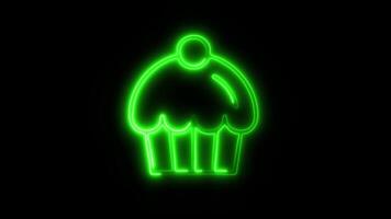Glowing Cupcake Icon and Symbol in Neon Animation on Black Background video