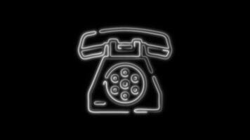 Glowing Telephone Icon and Symbol in Neon Animation on Black Background video