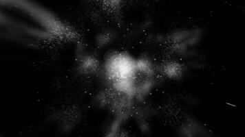 Dynamic black and white explosion of particles creating a cosmic, dramatic visual effect. Perfect for space themes, abstract backgrounds, or sci-fi projects. seamless loop video