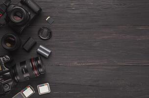 Photo equipment frame. Top view of diverse personal equipment for photographer or creative designer, copy space
