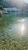 Clear waters and charming views in Croatia's serene coastal area during sunset video