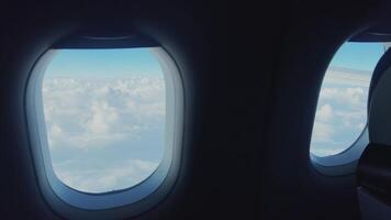 Experience the Breathtaking Views from an Airplane Window High Above the Clouds video