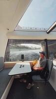 Experience a Serene Boat Interior that Offers Stunning Water Views video
