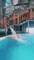 Enjoy a Relaxing Day at the Pool Surrounded by Refreshing Water Features video